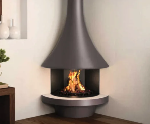 A wide-skirted suspended fireplace burning in a minimal white room
