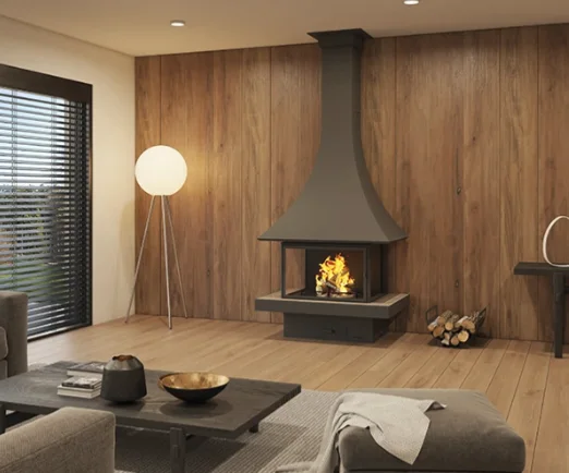 A black suspended fireplace against a wood-panelled wall in the evening