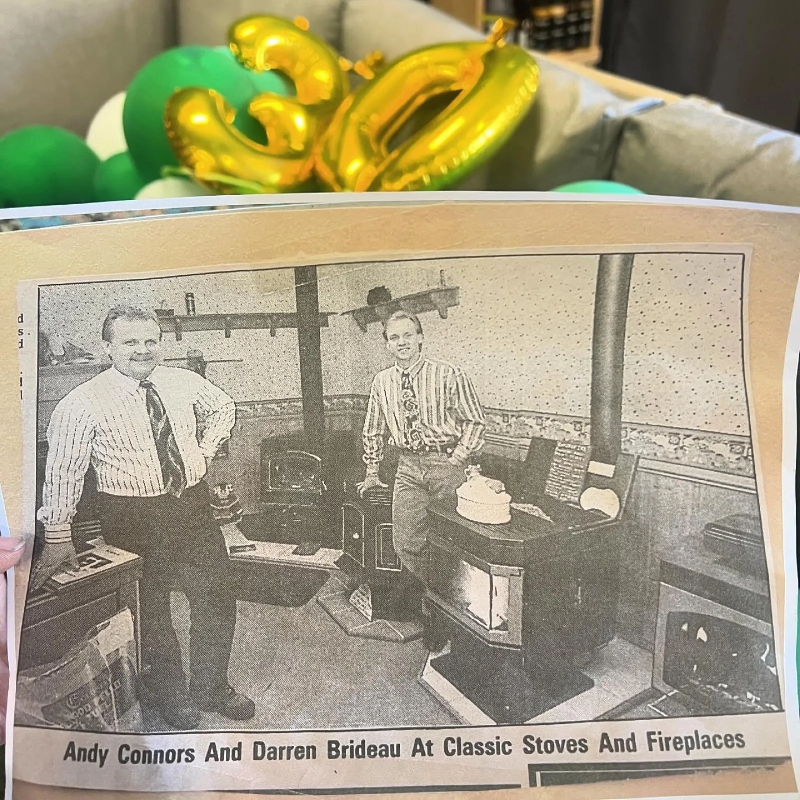 A scrapbook page holding a newspaper clipping from the early days of Classic Stoves and Fireplaces