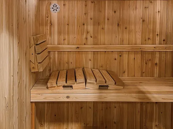 Cedar backrests set up along the sauna bench